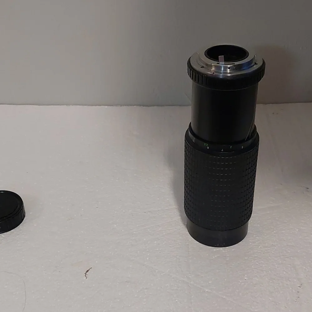 TELESOR Zoom Lens MC 1:5.6 f= 75-300mm with lens cap and UV filter